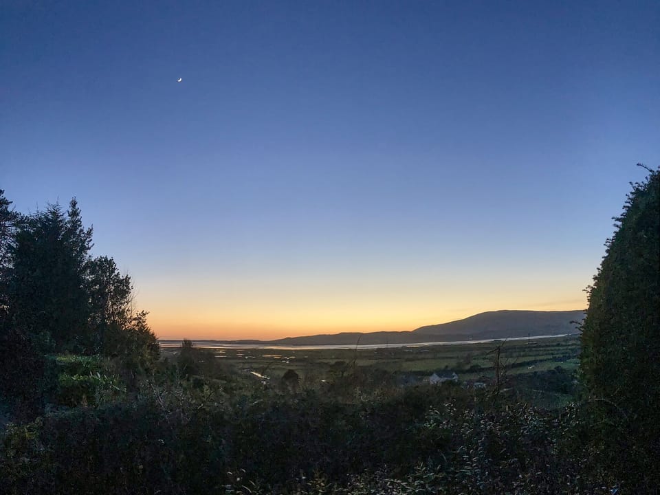 The sun setting behind Black Combe from wallend | Thornton Cottage, Kirkby in Furness