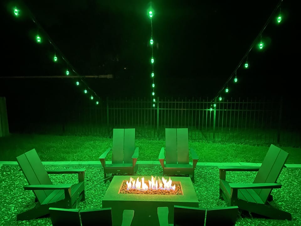 Relax near the outdoor fire pit after a day filled with activities.
