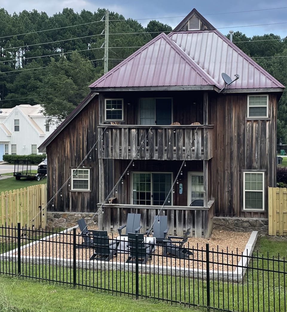 Backyard to include upper and lower balconies.