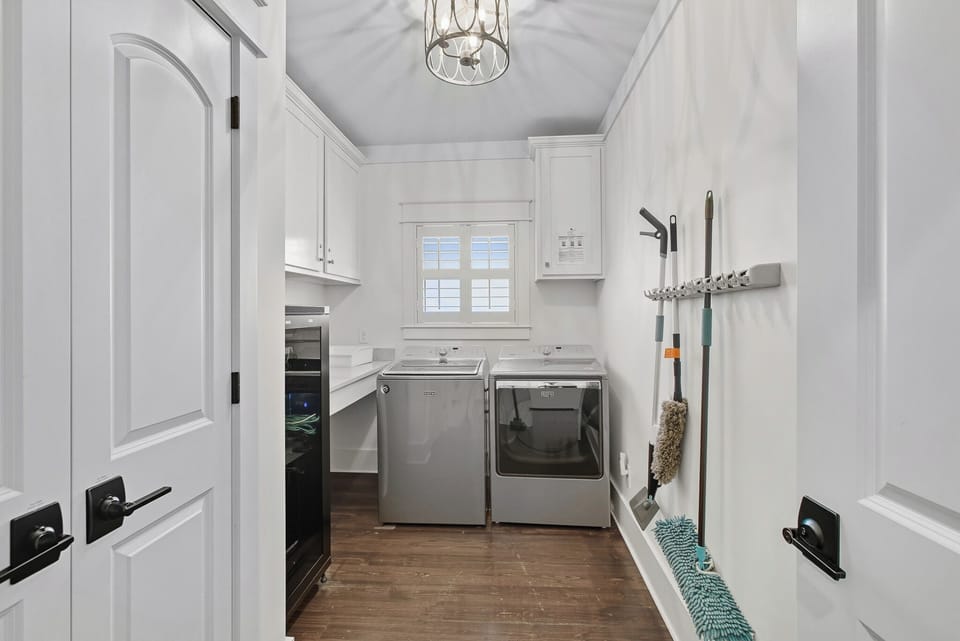 Full laundry and utility room for guest convenience.