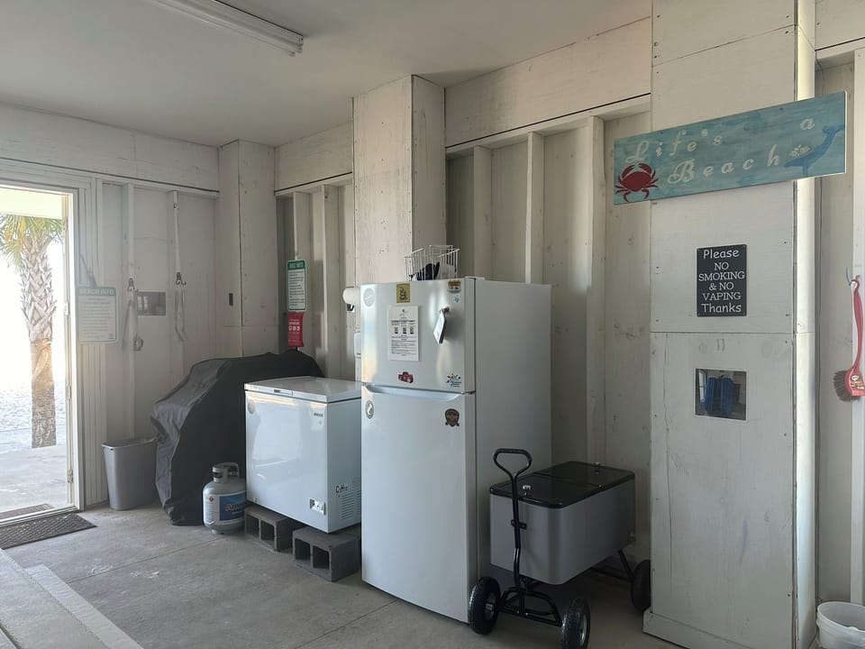 Extra refrigerator and deep freezer available in the game room.