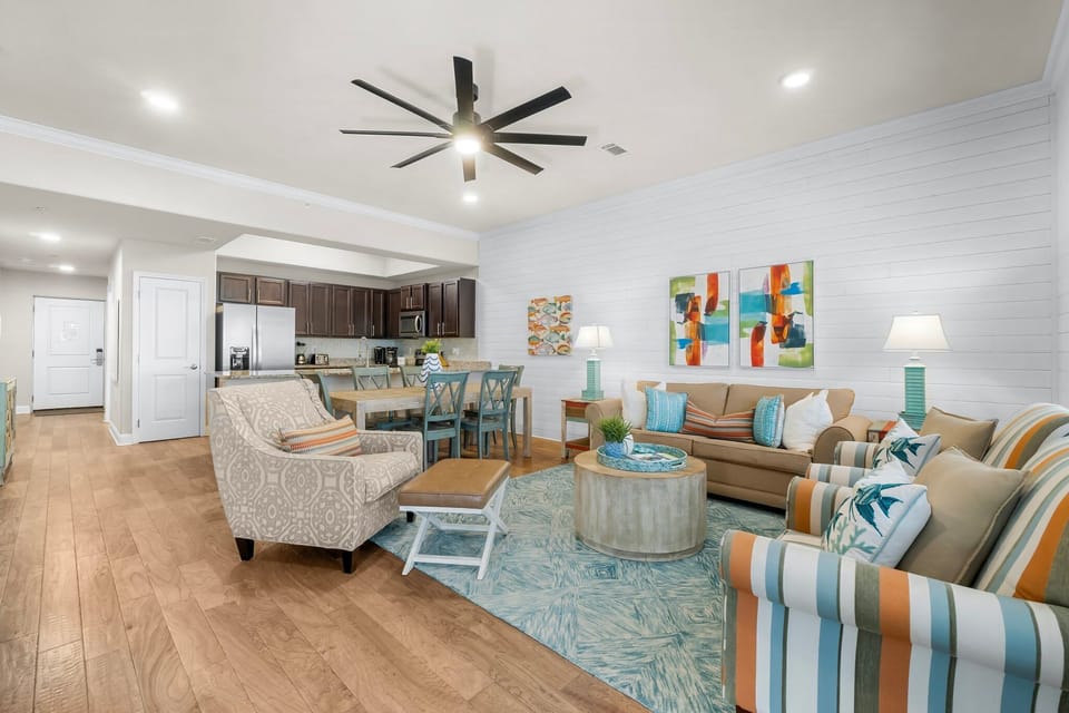 Living Room- 
Queen Sleeper Sofa 
Smart TV 
Ground Floor Patio Access