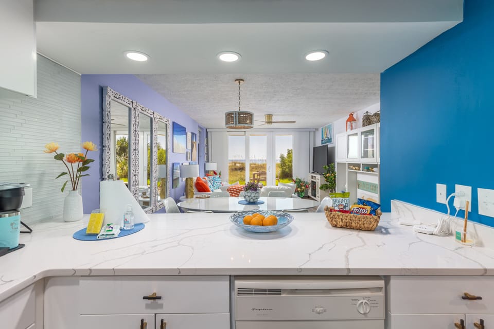 Nothing obstructs the view from the kitchen all the way to the living room.