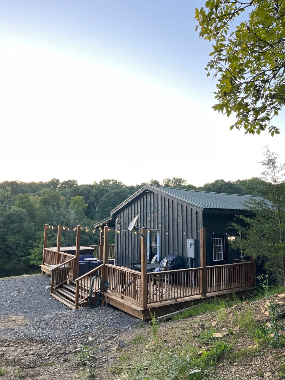 Outdoor dining table, sectional, propane fire pit, and hot tub