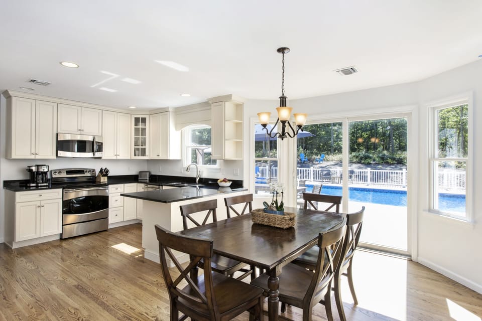 Eat-In Kitchen on Main Floor (leading out to deck and swimming pool)