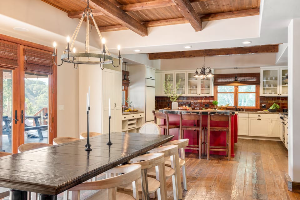 Dining table and kitchen.