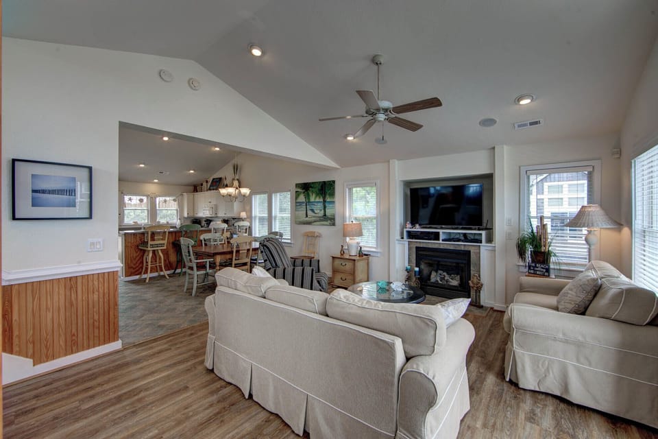 Living Room - Light, bright, coastal and cozy, relax and lounge in this  Ace's delight living room.