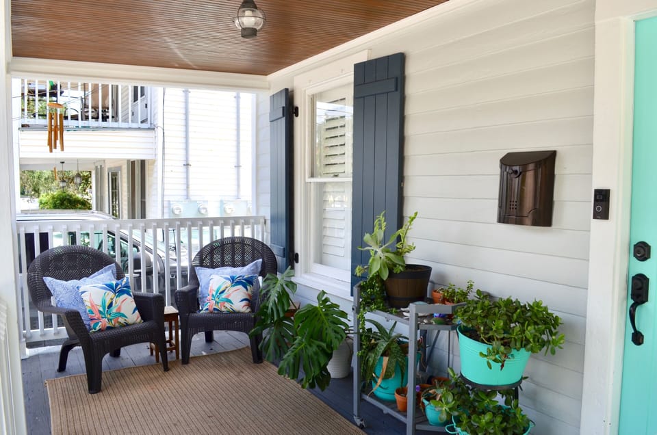 The front porch is ideal for evenings and the occasional rainy day