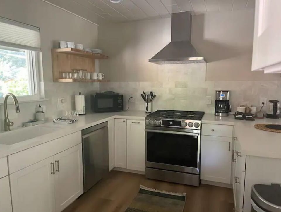 Newly renovated, well stocked for easy meal prep or preparing take in.
