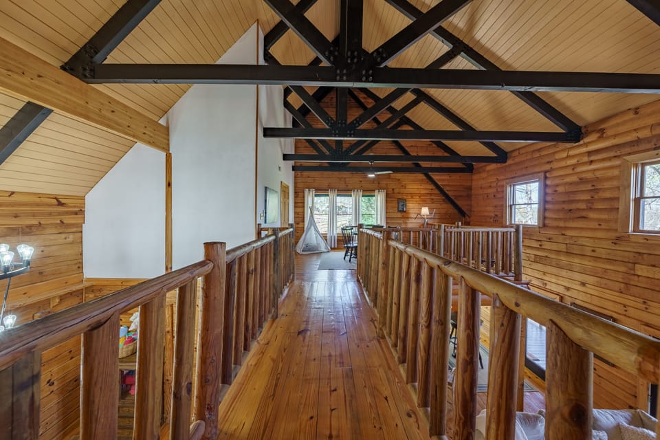 Stunning architectural view from the top master bedroom overlooking the loft