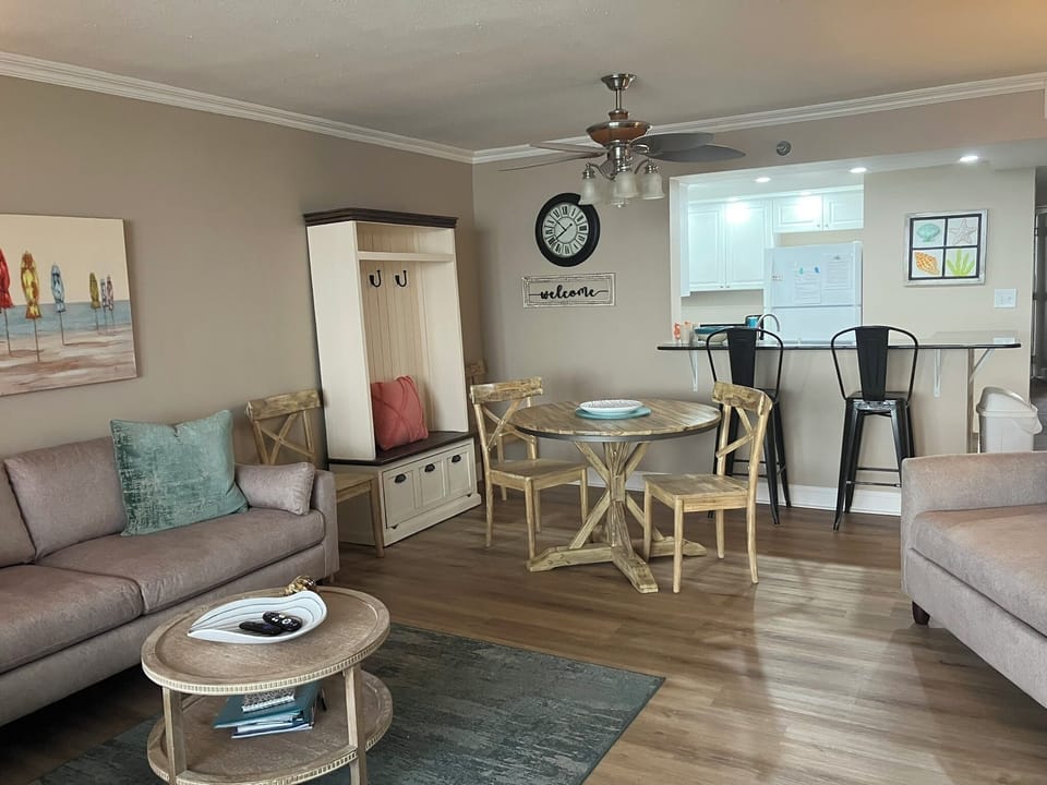 Dining Table has 4 chairs plus 2 bar height chairs at Kitchen Counter