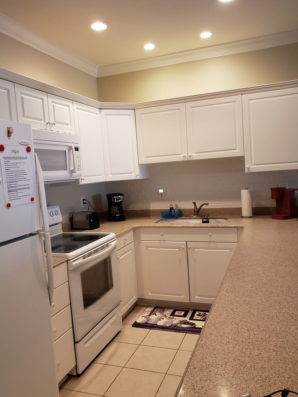 Full kitchen. Everything you need to eat in or cook. Breakfast bar for 3