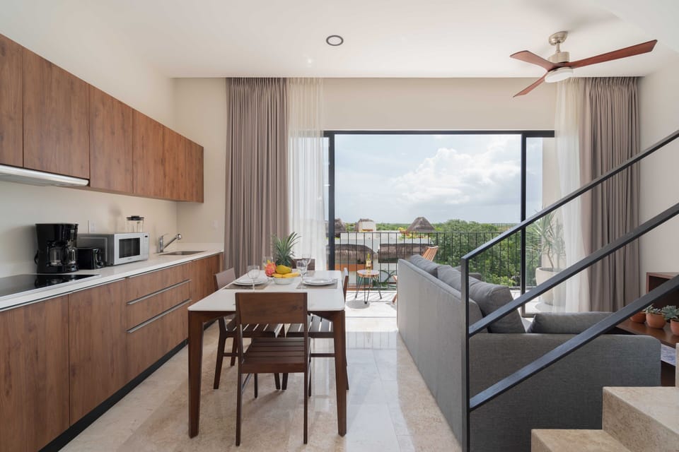 Living room, Dinning table, AC, Ceiling fan, Smart TV.