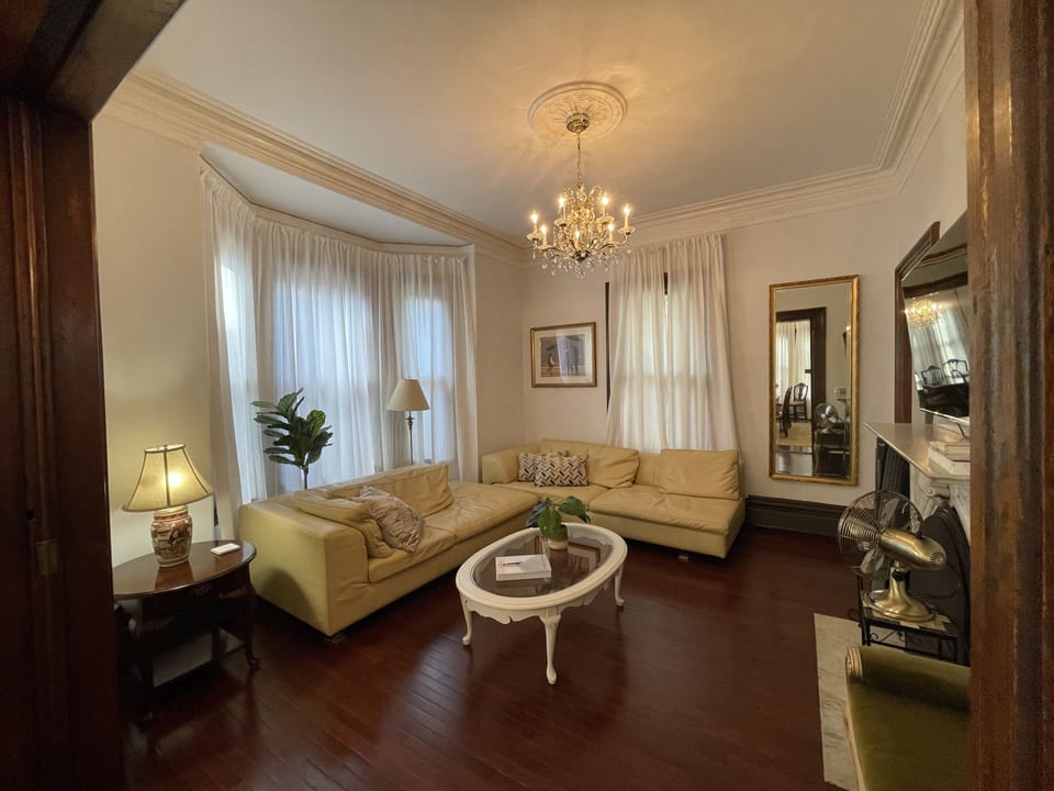 Living room: plenty of seating + 55 inch smart tv