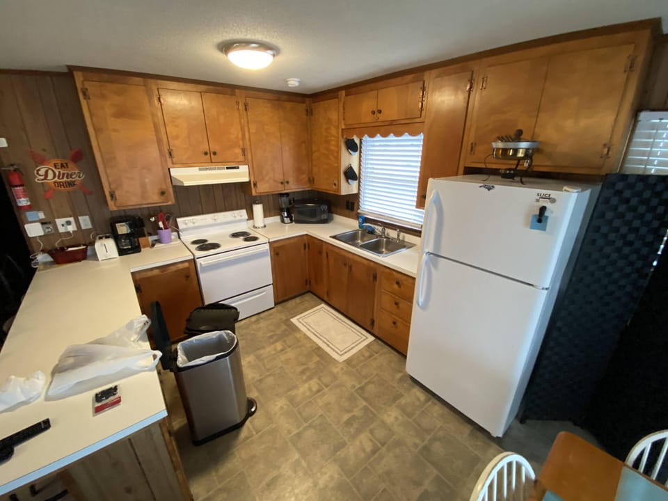 All needed kitchen supplies and an ice maker!