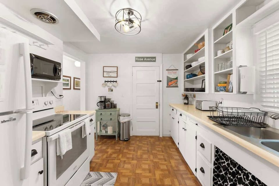 The kitchen is set up for cooking and has all dishes, pots and pans, utensils, spices, coffee, tea, and more!
