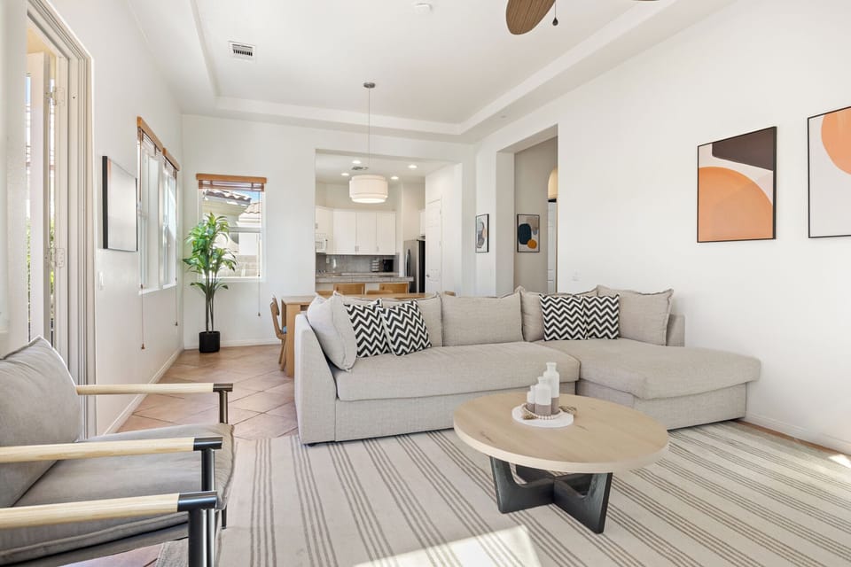 Light-filled room connecting to dining area flows perfectly for group gatherings.