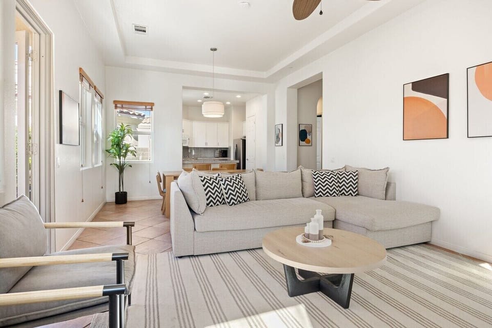 Light-filled room connecting to dining area flows perfectly for group gatherings.