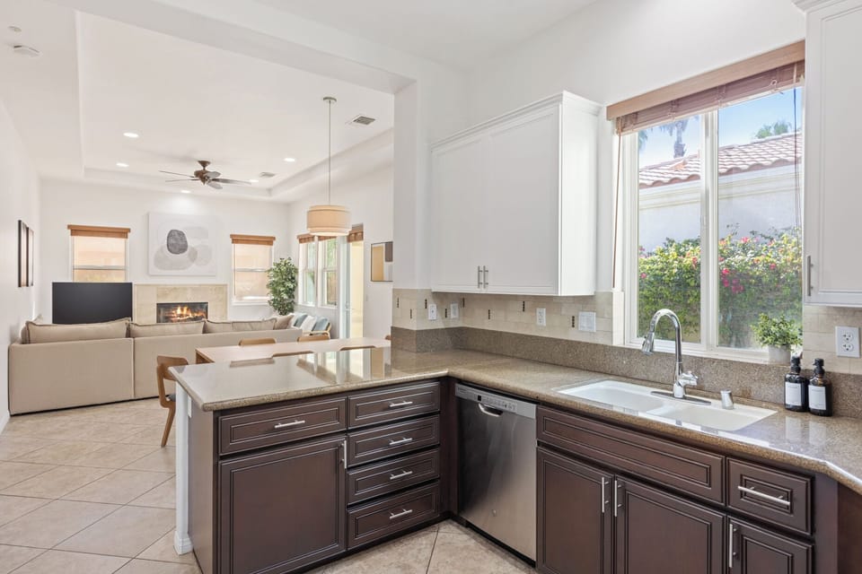 Cook up anything with gas range, granite counters, and all the kitchen tools.