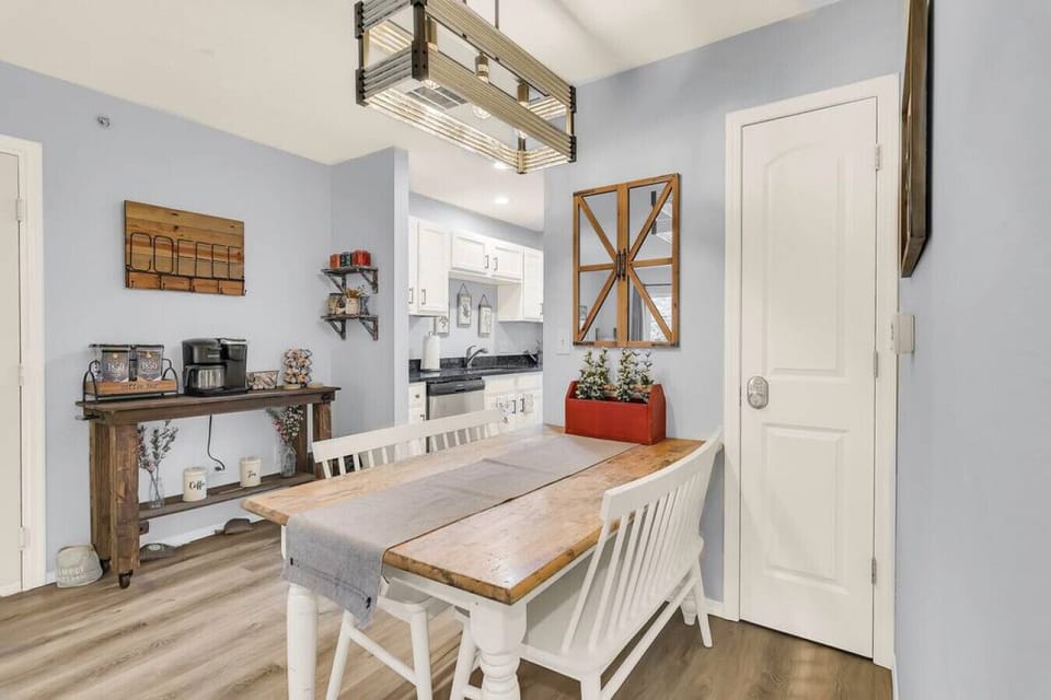 Dining area for the family! There's extra folding chairs and table in the bedroom closet.