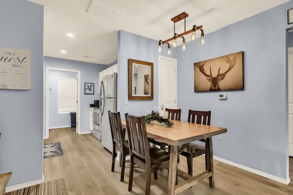 Dining area - with extra folding chairs and table in the bedroom closet.