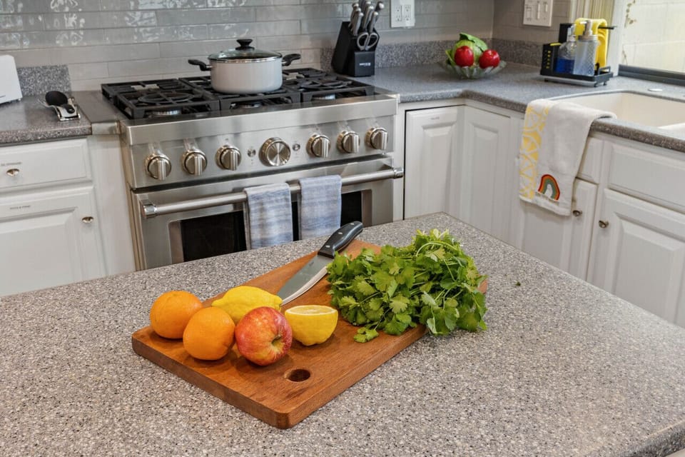 Prepare your meal in the beautiful kitchen with a 6-burner professional range, ultra-quiet dishwasher, full size refrigerator, microwave, and all the dishes, utensils, pots and pans necessary to make you feel at home.