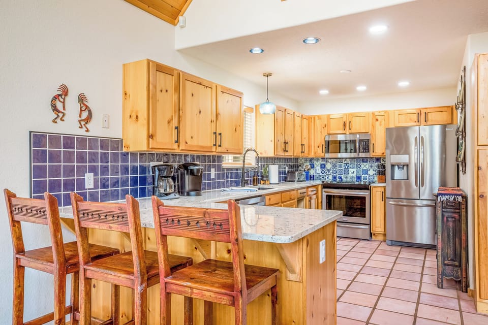 The best seat in the house is watching the chef in this brand new remodeled kitchen!