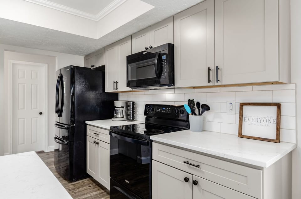 Kitchen with all needed supplies, plus Keurig coffee maker with coffee pods 