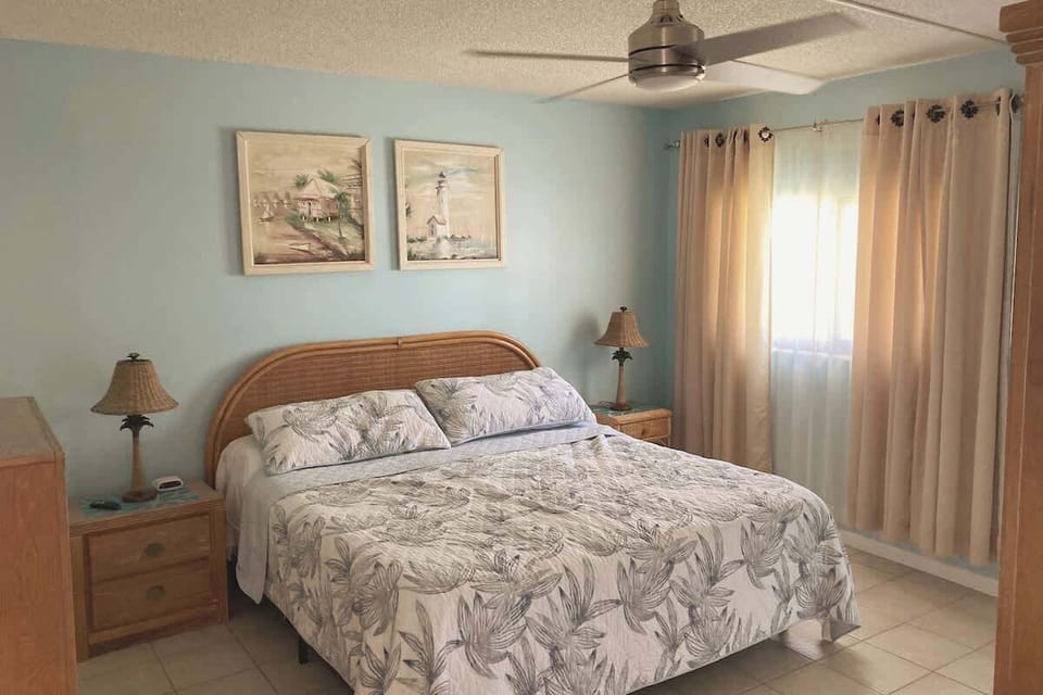 The master bedroom with a king-sized bed is your haven for deep sleep. 