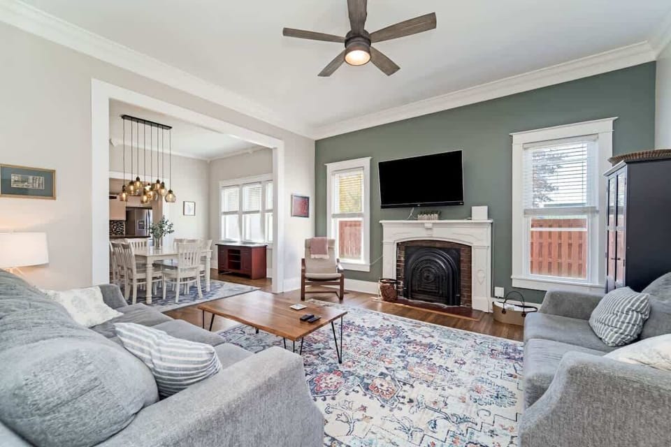 Relax on the soft couch and enjoy a conversation, watching a movie surrounded by the warm glow of fireplace.