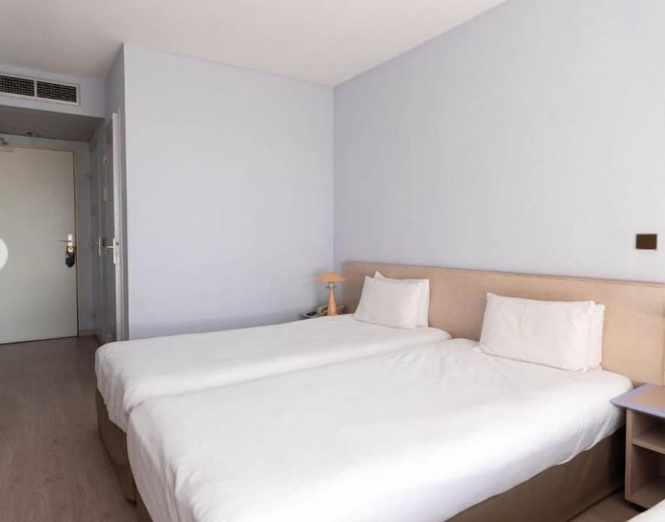 Get a peaceful night sleep in our cozy bedroom.