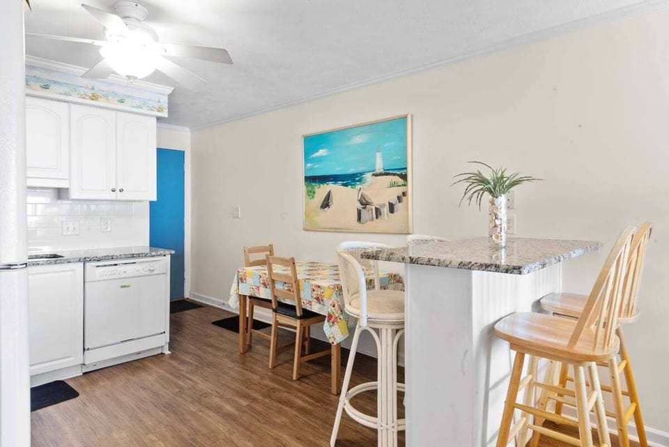 Dining table plus breakfast bar seating for meals together