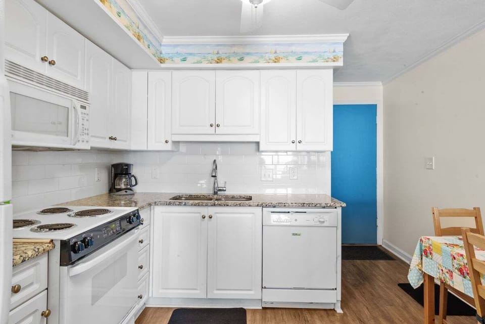 Full kitchen with Keurig (not shown), dishwasher, and microwave