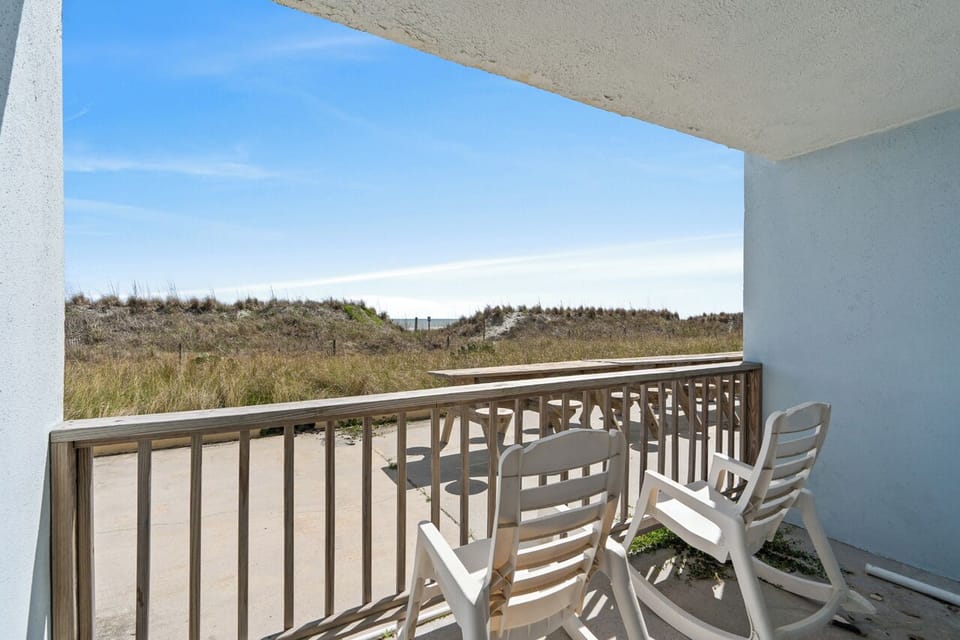 Dunes are all that's keeping  you from seeing the ocean, but you're literally there at the beach.