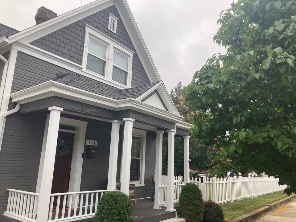 Our little grey house and the fully fenced in side yard.  We are fortunate to sit on two lots.  One for the home, the other to relax in.  