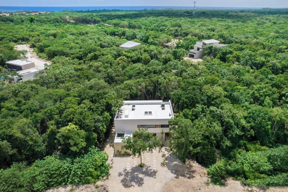 Just 3/4 miles from the beach! Gym and semi olympic pool only 50 yards to the left of the hose (seen in the pic). PLEASE NOTE LANDSCAPE HAS CHANGED DUE TO CONSTRUCTION OF OTHER HOUSES!