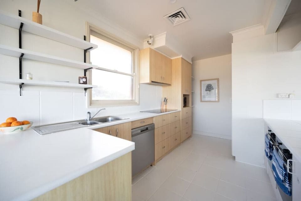 [Kitchen] Thoughtfully designed with essential amenities, including a high-quality stove for cooking delicious meals, a dedicated workspace for culinary preparations, and a convenient sink for easy clean-up.