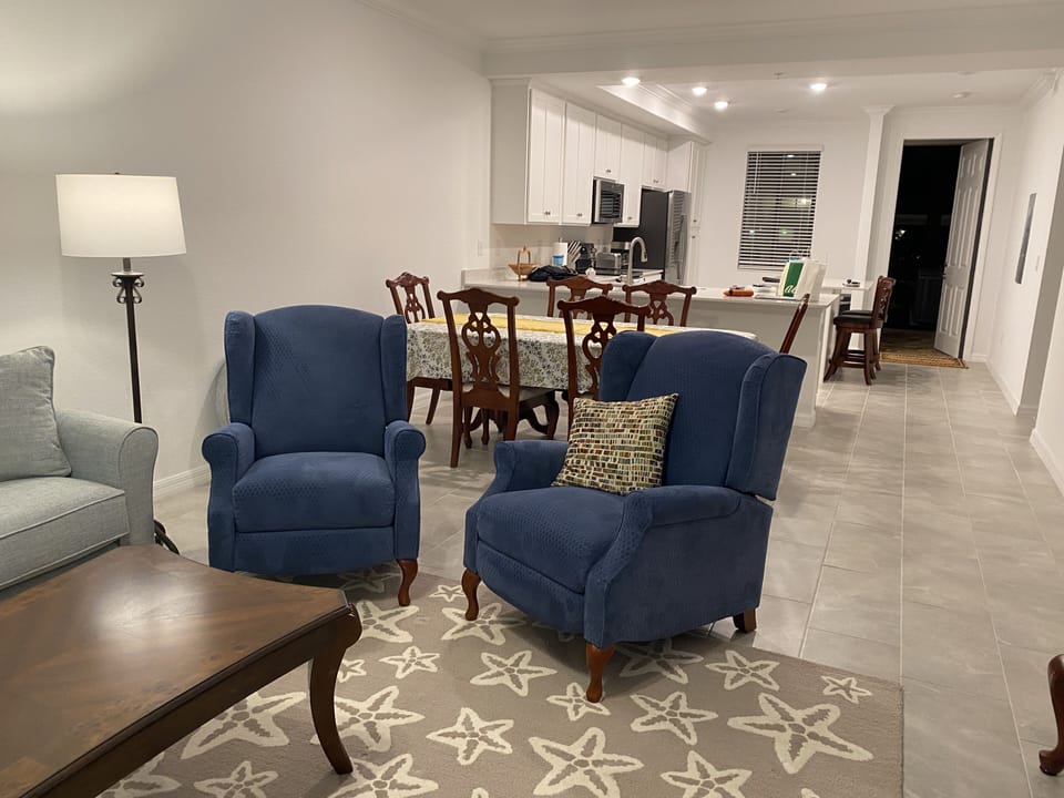 View of living area to the pass-through kitchen.