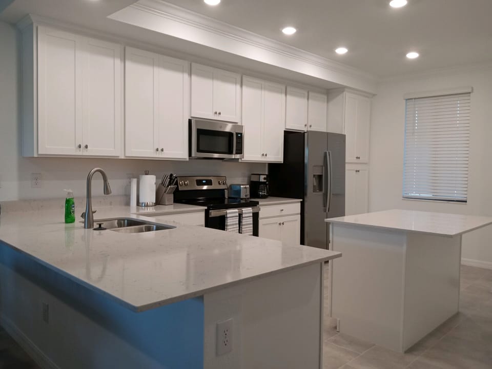 Plenty of storage and preparation and new, stainless steel appliances. 