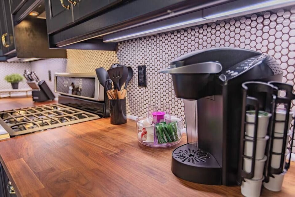 Indulge in our coffee bar featuring a Keurig machine, offering a variety of K-cup flavors for your choice. Savor the perfect cup tailored to your preference.