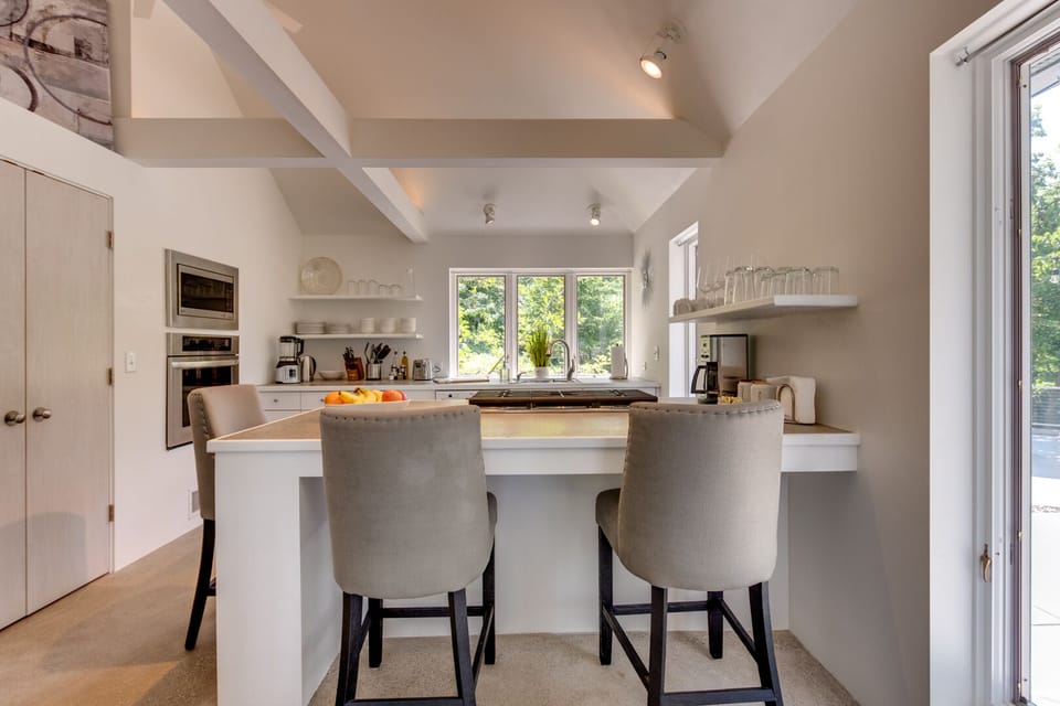 View toward the fully equipped kitchen