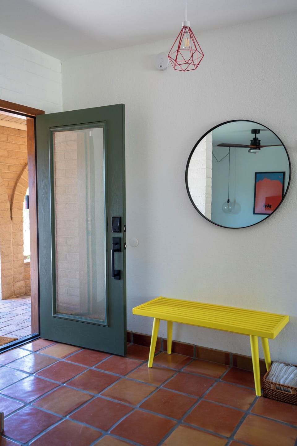 The entry leads into the spacious living room & dining area - the entire home has authentic hand made Saltillo tile from Mexico.