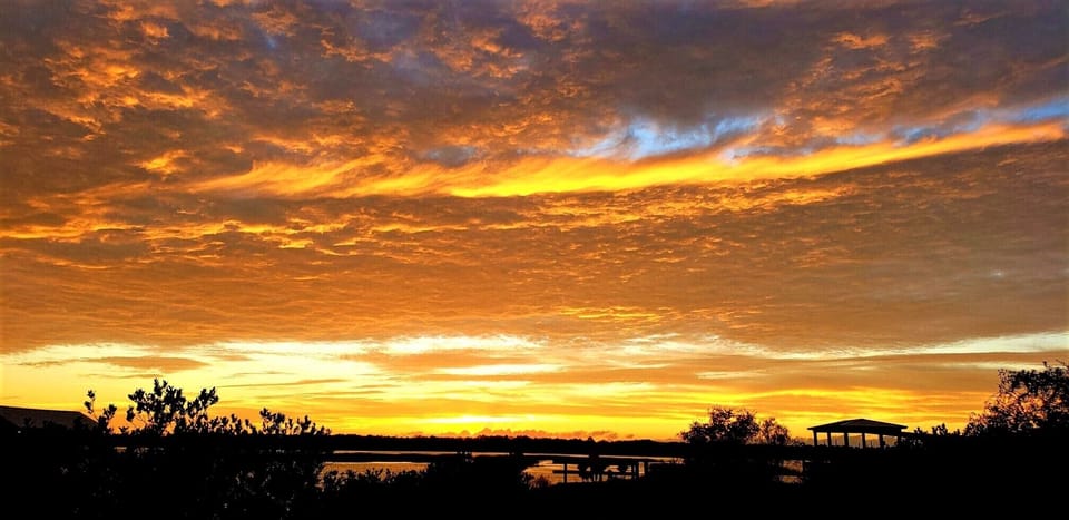 Sunset at the end of street.