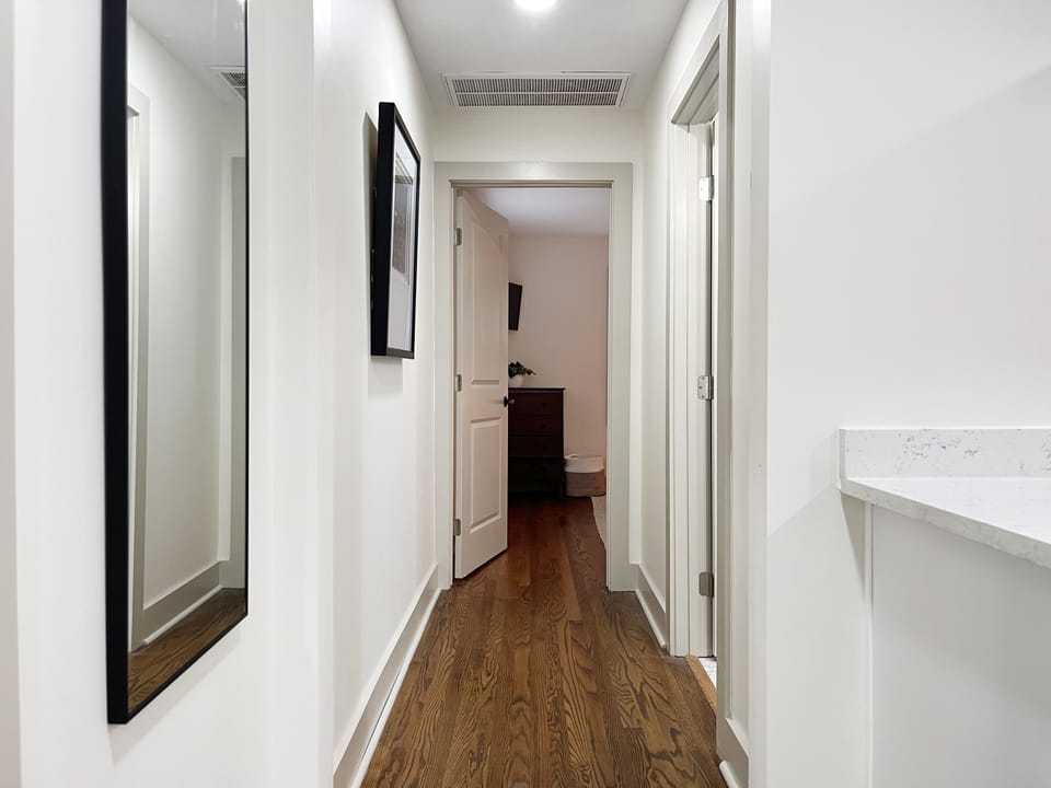 Hallway to bathroom and bedroom.