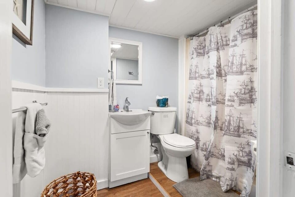 Full bathroom with stand up shower.