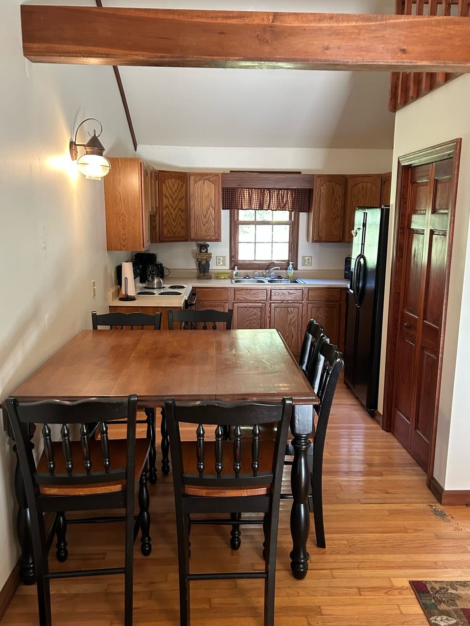 Stocked kitchen with seating for six 