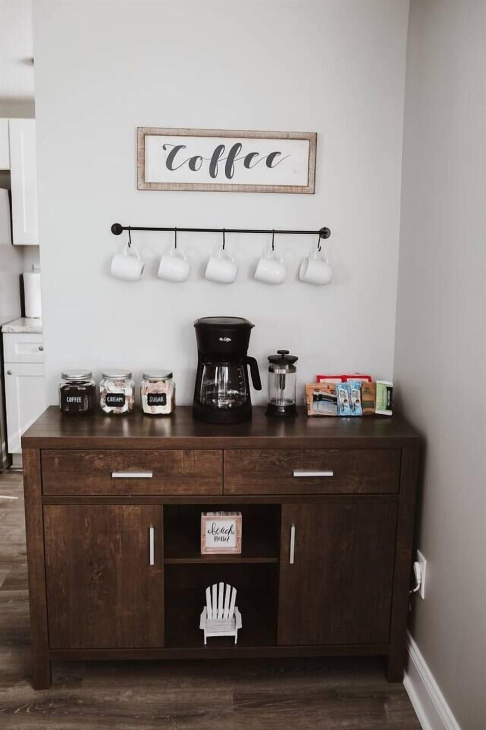 Coffee bar with complimentary snacks, coffee supplies, and more