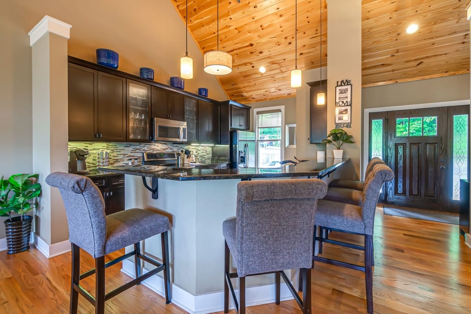 Open concept kitchen complete with plenty of amenities for your stay.
