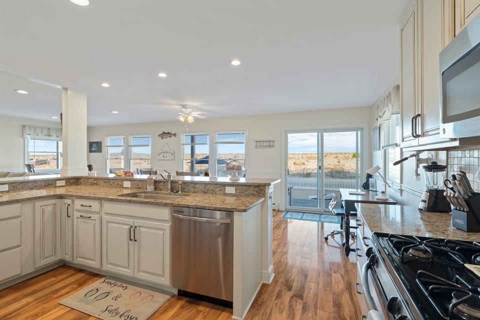 Full modern kitchen - bar height seating.