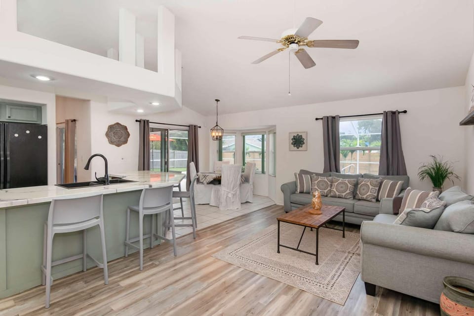Open-concept kitchen, informal dining area and second living room